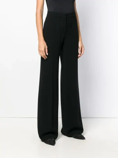 Shop Max Mara Flared Tailored Trousers In Black