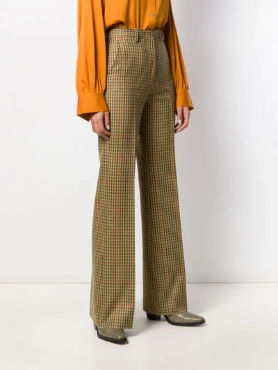 Shop Etro Houndstooth Print Trousers In Green