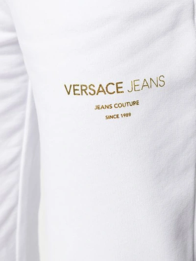 Shop Versace Jeans Logo Sweat Pants In White