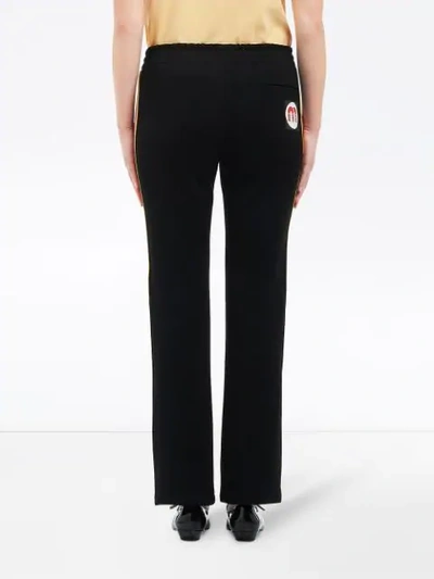 Shop Miu Miu Side Stripes Detail Track Trousers In Black