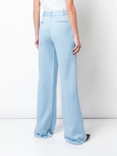 Shop Adam Lippes Flared High Waisted Trousers In Blue