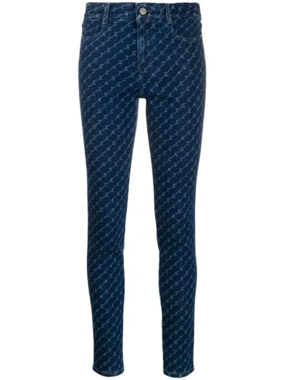 Shop Stella Mccartney High-rise Skinny Monogram Denim Jeans In Blue