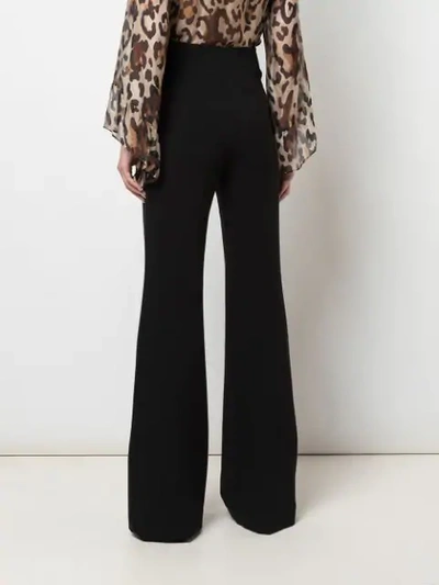 Shop Alice And Olivia High Waist Flared Trousers In Black