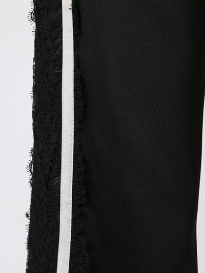 Shop Giambattista Valli Side Stripe Flared Trousers In Black