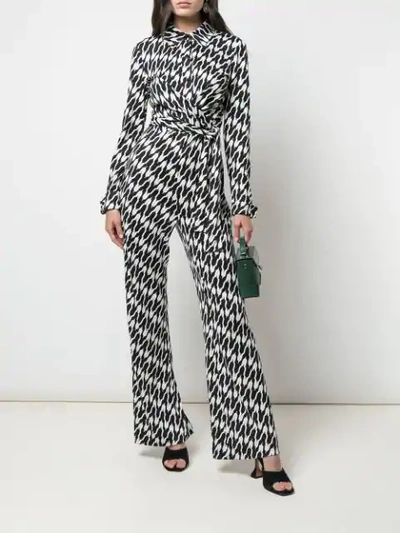 Shop Diane Von Furstenberg Michele Silk Jumpsuit In Black
