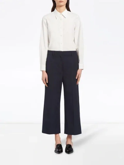 Shop Prada Cropped Chino Trousers In Blue