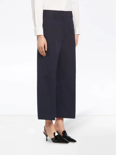 Shop Prada Cropped Chino Trousers In Blue