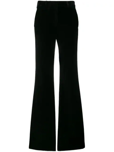 Shop Etro Flared Style Trousers In Black