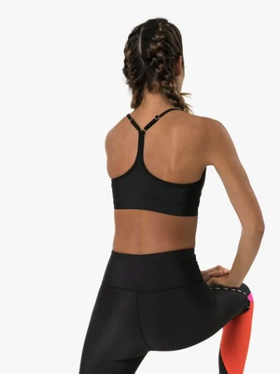 Shop P.e Nation Training Day Logo Sports Bra In Black