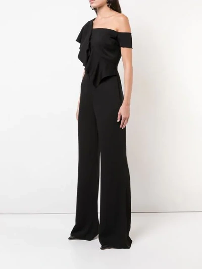 Shop Nicole Miller Asymmetric Ruffle Jumpsuit In Black