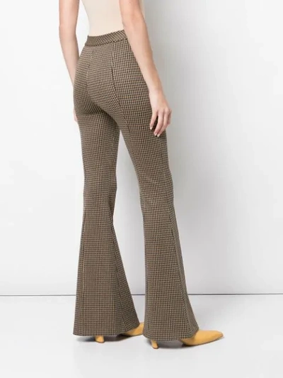 Shop Rosetta Getty Pintuck Flared Trousers In Brown