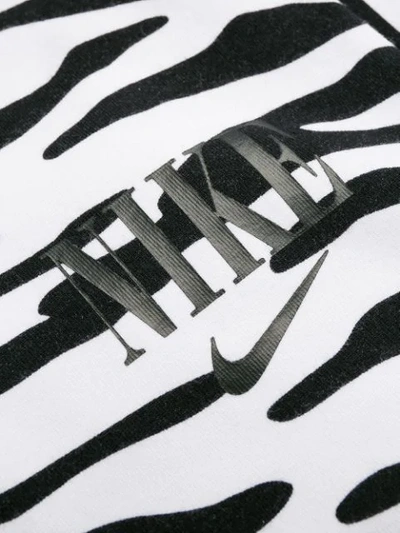 Shop Nike Printed Leggings In Black