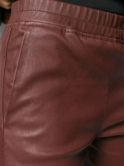 Shop Arma Trousers In Brown