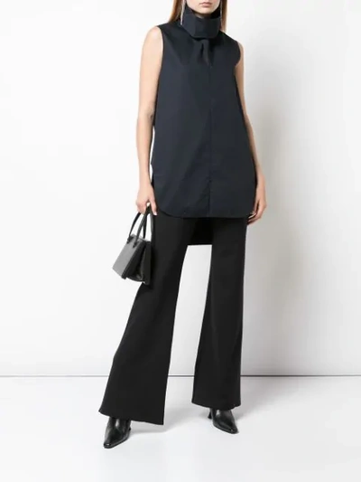 Shop The Row High Waist Flared Trousers In Black