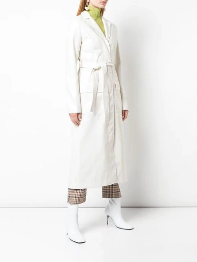 Shop Nomia Belted Trench Coat In White