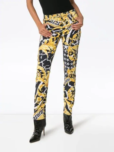 VERSACE SAVAGE BAROQUE PRINT SLIM-FIT JEANS - A7900