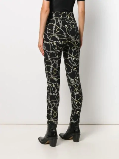 Shop Pinko Jewel Print Skinny Trousers In Black