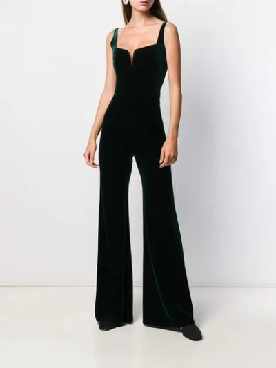 Shop Galvan Velvet Eclipse Jumpsuit In Green