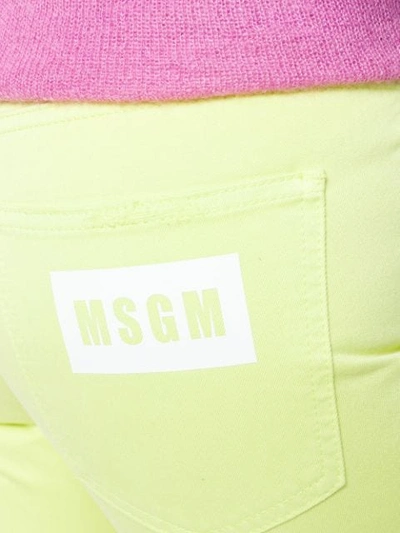 Shop Msgm Cropped Denim Jeans - Yellow