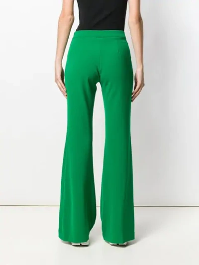Shop P.a.r.o.s.h Flared Style Trousers In Green