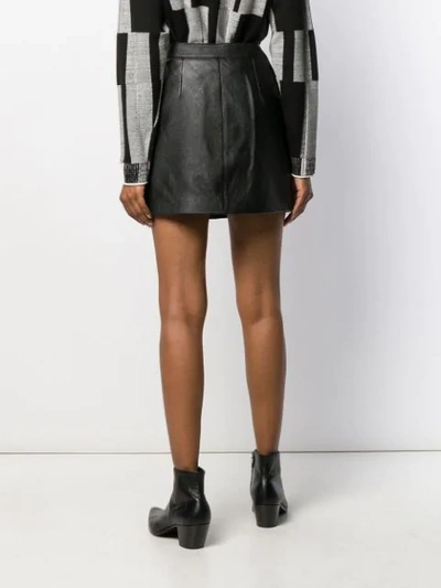 Shop Saint Laurent Studded Leather Skirt In Black