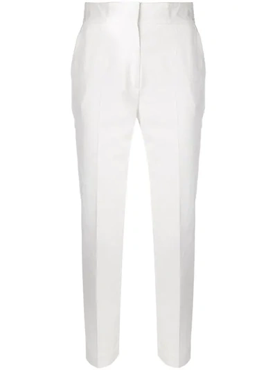 Shop Msgm Cropped Creased Trousers In White