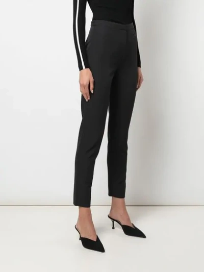 Shop Milly Cropped Slim-fit Trousers In Black