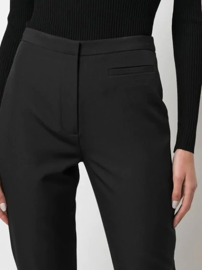 Shop Milly Cropped Slim-fit Trousers In Black