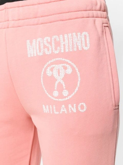 Shop Moschino Milano Track Pants - Pink