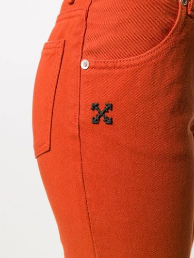 Shop Off-white Arrow Logo Cropped Jeans In Orange