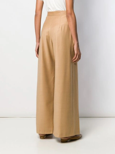 Shop Materiel Pleated Palazzo Pants In Neutrals
