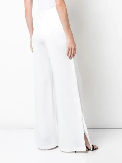 Shop Alexis Roque Trousers In White
