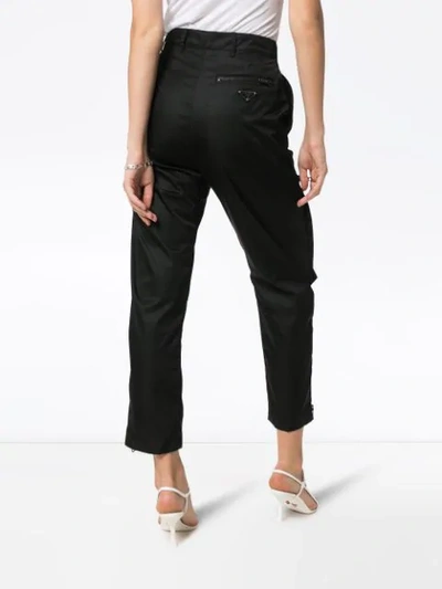 Shop Prada Gabardine Zip-detail Trousers In Black