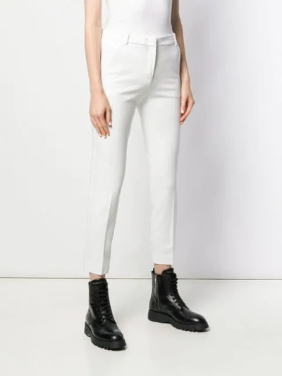 Shop Pinko Skinny Trousers In White