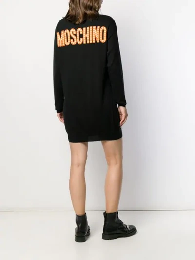 Shop Moschino Graphic Print Knitted Sweater Dress In Black