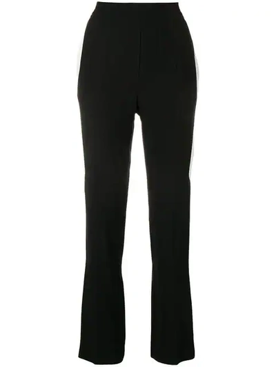 Shop Givenchy Side Stripe Trousers In Black