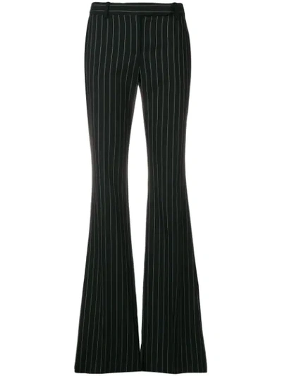 Shop Alexander Mcqueen Flared Pinstripe Trousers - Black