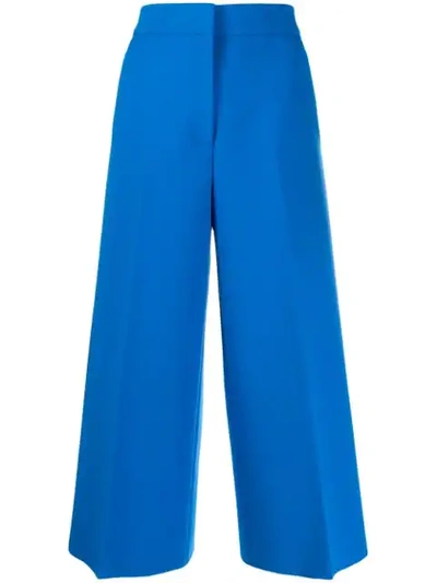 Shop Msgm Cropped Tailored Trousers In Blue