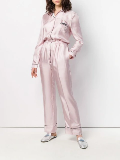Shop Prada Silk Logo Jumpsuit In Pink