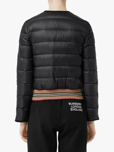 Shop Burberry Icon Stripe Detail Down-filled Puffer Jacket In Black