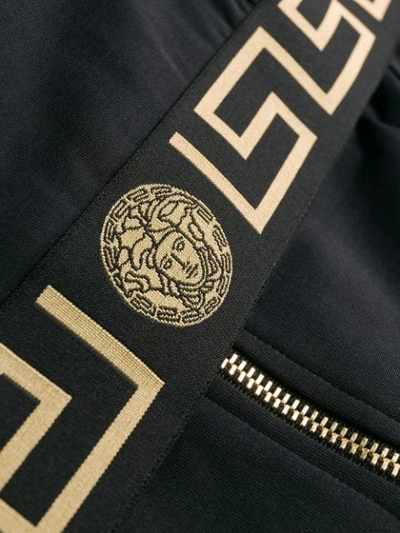 Shop Versace Greek Key Hooded Jacket In A1008 Black Gold