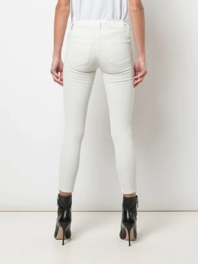 Shop J Brand Cropped Mid-rise Skinny Jeans In White