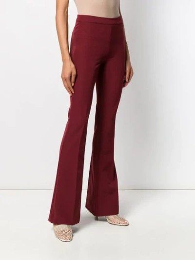 Shop Blanca Mid-rise Flared Trousers In Red