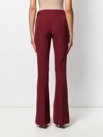 Shop Blanca Mid-rise Flared Trousers In Red