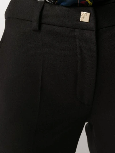 Shop Versace Straight Plain Trousers In Black