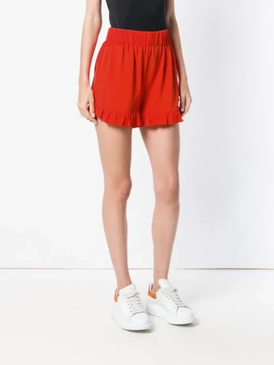 Shop Ganni Ruffled Trim Shorts - Red