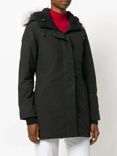 Shop Canada Goose Fur Trim Hooded Coat In 61 Black