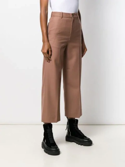 Shop Moncler Pleated Cropped Trousers In Neutrals