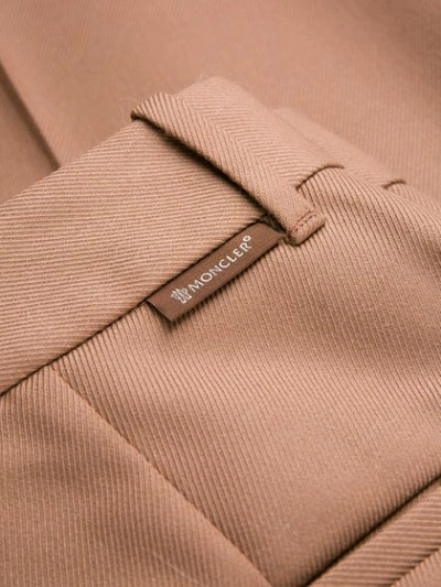 Shop Moncler Pleated Cropped Trousers In Neutrals