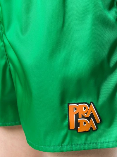 Shop Prada Logo Patch Shorts In Green